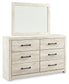Cambeck Queen Upholstered Panel Headboard with Mirrored Dresser and Chest