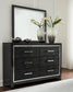 Kaydell Queen Upholstered Panel Headboard with Mirrored Dresser and Chest